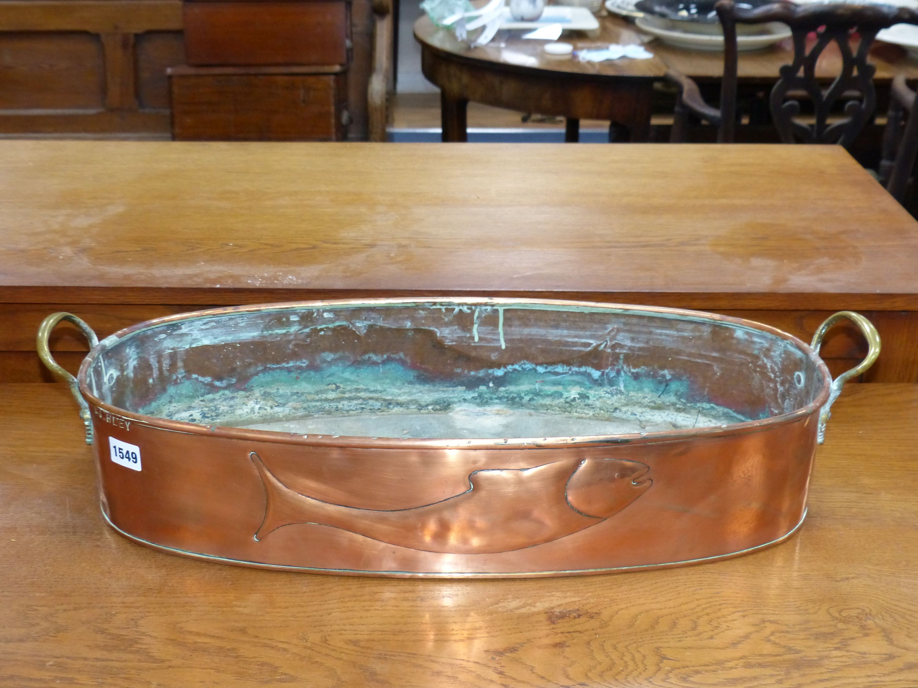 A copper fish kettle